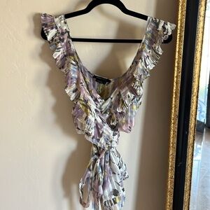BCBGMAXAZRIA  100% Silk blouse that wraps at upper bodice